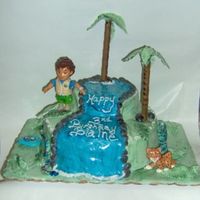 Diego Waterfall I made this cake last minute for my son's half brother - he's such a cutie. Small waterfall with BC and MMF. Diego toys on cake....