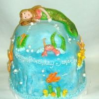 Under Water - Mermaid MMF with BC - my first try at a mermaid - my son said the eyes looked funny... i tend to agree with him. lol This was 6 layers of cake...