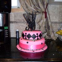 30Th Birthday/ First 2 Tiered 30th birthday cake and my first 2 tiered caked, both cakes are chocolate fudge bottom is chocolate mousse with bananas and the top is...