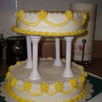 3Rd Course Final!! This is a basic yellow cake with bc! I decided to make the flowers yellow to "match" the cake