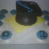 Book/cap Graduation Cake Book is vanilla cake with s'berry filling, covered in b'cream and fondant, cap is s'berry cake and the square is rice...