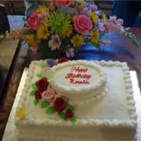 Birthday Cake White cake, buttercream frosting with gumpaste roses. Made this for my mother-in-laws b'day. First time to do gumpaste roses.