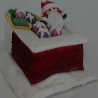 Santa On Chimney Fondant covered cake and figures