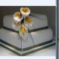 Arum (Calla) Lillies Fruit Cakes iced in fondant. Flowers made from flowerpaste.