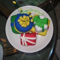 Pile Of Presents My first attempt at a "fantasy" shaped cake...not bad, but I need more practice!