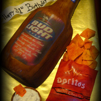 Bud Light Bottle This cake was made for a friend of a friend. Two of his favorite things are Bud Light and Doritos with sour cream. TFL