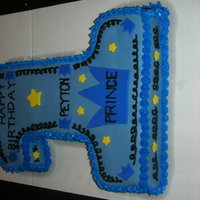 Boy First Birthday My friend had some decorations that she wanted matched, so I made this cake. I also made a smash cake to go along with it.