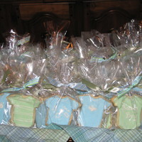 Joy Boy Onesie Cookies Made these for my SIL's baby shower. So much fun to do! Thanks to many CC'ers for inspiration on these!