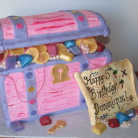 Pink Treasure Chest & Map All edible, except the string of pink pearls. Buttercream with fondant accents. Jewels are chocolate.
