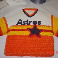 Houston Astros Jersey Groom's Cake Chocolate cake with buttercream icing. Cake is made to look like a Houston Astros Baseball Jersey (the Rainbow jersey). The groom is a big...
