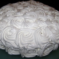 Roses. I tried to cover the cake with only roses, what do you think?