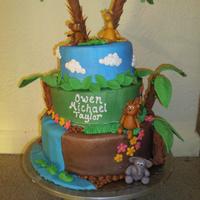 Jungle Shower Cake this was based off quite a few I saw here on CC.. cakes iced in BC w/ fondant detail, pretzel rods used for tree trunks