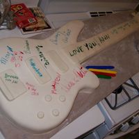 Autograph Guitar Cake based on recipients guitar. Friends and family signed Birthday wishes on cake with edible ink.