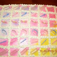 Baby Shower GOLDEN BUTTER CAKE WITH RASPBERRY CREAM FILLNG AND BUTTERCREAM ICING.