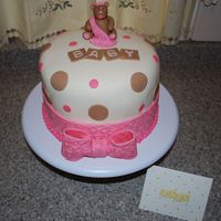 Girl Teddy Bear Yellow cake w/ strawberry mousse filling. Covered in white chocolate fondant. Fondant/gumpaste teddy. Made to match teddy bear theme and...