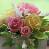 1St Gumpaste Floral Spray My first attempt at wiring a gumpaste flower spray. Actually, first time making gumpaste roses, leaves, etc, too!