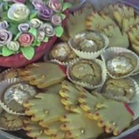Bridal Shower Hand Cookies The rose basket was made entirely of gum paste, including the bowl. The hand cookiesare coated in marzipan. I painted the cookies (nail...