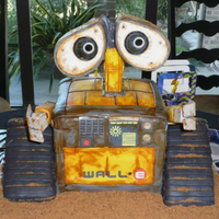 Wall-E For my grandson's birthday. Managed to accomplish this cake with 4 small children running around in the house, so even though it'...