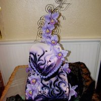 Purple Orchids This was for my niece's wedding shower/going away party. It is a hawaiian/tattoo theme focused on her favorite color-purple. My first...
