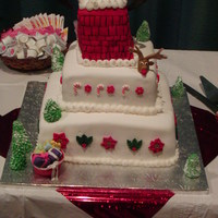 Christmas '09 Santa going down the chimney. Royal icing flowers. This was a fun cake.