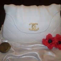 White Chanel Handbag Made this Handbag for my moms birthday. Red Velvet cake with cream cheese filliing.
