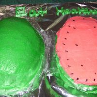 Sany0759.jpg My first watermelon cake, its missing its stripes look but thats ok :).