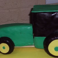 John Deere Tractor John Deere tractor made from rice krispie treats. For a 3 yr old birthday boy who loves tractors.