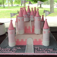 Wonky Pink Castle B-day cake for my neice and her friend for their 2nd birthday. I wanted to make the turrets out of foam covered in fondant, but was unable...