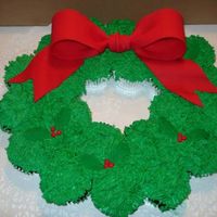 Xmas Cupcake Wreath I'm a newbie to cake decorating and very pleased with how this turned out. It was for my granddaughter's school party. I...