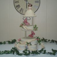Kassi's Cake This was for a cousin's quinceanera. I had a lot of fun working on this one. Simple yet elegant.