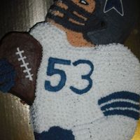 Dallas Cowboys Cake Made this one for my father in law's birthday. The number on the jersey is actually his age.