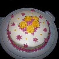 Roses My first cake after I learned how to make roses and drop flowers.
