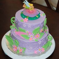 Tinkerbell I got lots of ideas for this cake from CC website. The topper came from walmart. The rest is BC with fondant accents. TFL