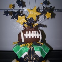 Saints Football Cake Vanilla cake buttercream filling fondant decor, cake football.