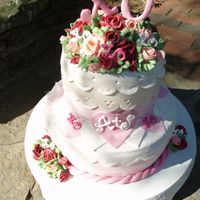 Xoxoxo A wedding shower cake with scalloped eyelet fondant lace and royal icing letters.