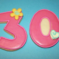 30Th Birthday Cookie Favors Party favors for a 30th birthday. Sugar cookies with glaze, royal icing and fondant accents.