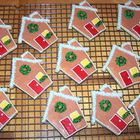 Gingerbread Houses I made these cookies for a dessert fundraiser at church. They are glazed and decorated with royal icing. The door and window are made from...