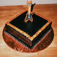 Ty's Guitar Cake... They didn't have the budget for a guitar shaped cake so I thought this up, sorry the pic is bad our digital is broken, this is a...