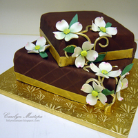 Dogwood Cake I made this for my dad's 80th birthday. I will try to add one with the gum paste "80" I cut with my Cricut Cake when I get...