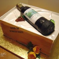 Wine Bottle Cake I made this for my brother's 50th birthday. The label was created using a photo of his house. Wine bottle was made with 3 aluminum...