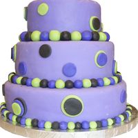 Purple Polka Dot My first tiered cake. Made with Marshmallow fondant.
