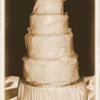 Old_Photo_Wrap_Cake.jpg White chocolate cake, white chocolate mousse filling in every layer, white chocolate ganache, wrapped on white chocolate clay