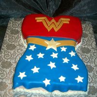 Wonder Woman Birthday Cake! I made this cake for my 32 yr. old daughter, to me she is Wonder Woman! It is a cake mix cake covered in fondant. Such a hit!