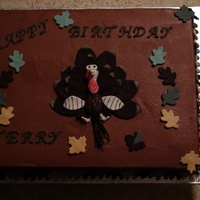 Turkey Season birthday cake for a hunter, done in chocolate butter cream and the turkey and leaves are done in fondant