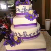 Purple Wedding My first time doing scroll work. 14 inch square, 12 inch round, 8 inch square and 6 inch round. Flavors were pina colada, key lime, orange...
