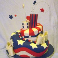 Topsy-Turvy 4Th Of July 10" & 6" carrot cakes with cream cheese filling and icing under MMF. So much fun to design and make even though it was quite...