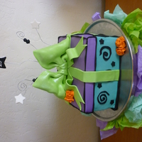 Hipster Gift Box My cousin's 13th Birthday Cake. Dark Chocolate Cake with Dark Chocolate Ganache filling. Covered and accented in fondant. Bow also...