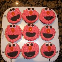 Elmo Cupcakes So this is my first attempt in making Elmo cookies, Tomorrow is my daughter birthday and thought "Let me give them a try" Hope...