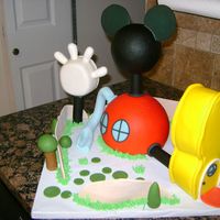 Mickey Mouse Clubhouse Thanks to the great ideas on this site. Covered in fondant.TFL Jen
