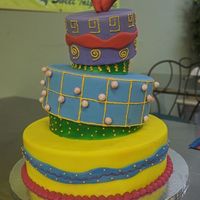 Bold Color Topsy-Turvy This is a cake I did in a Colette Peters class. I had fun with the wild colors. I realized at the last minute that I'd forgotten to...